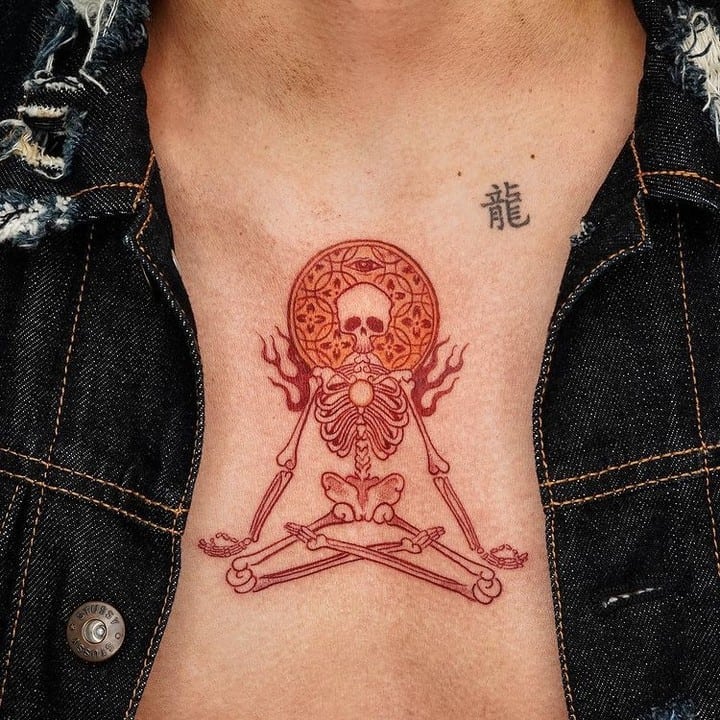 Meditating skeleton with mandala