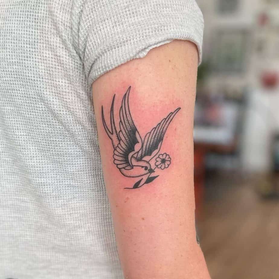 24. Carrying a flower