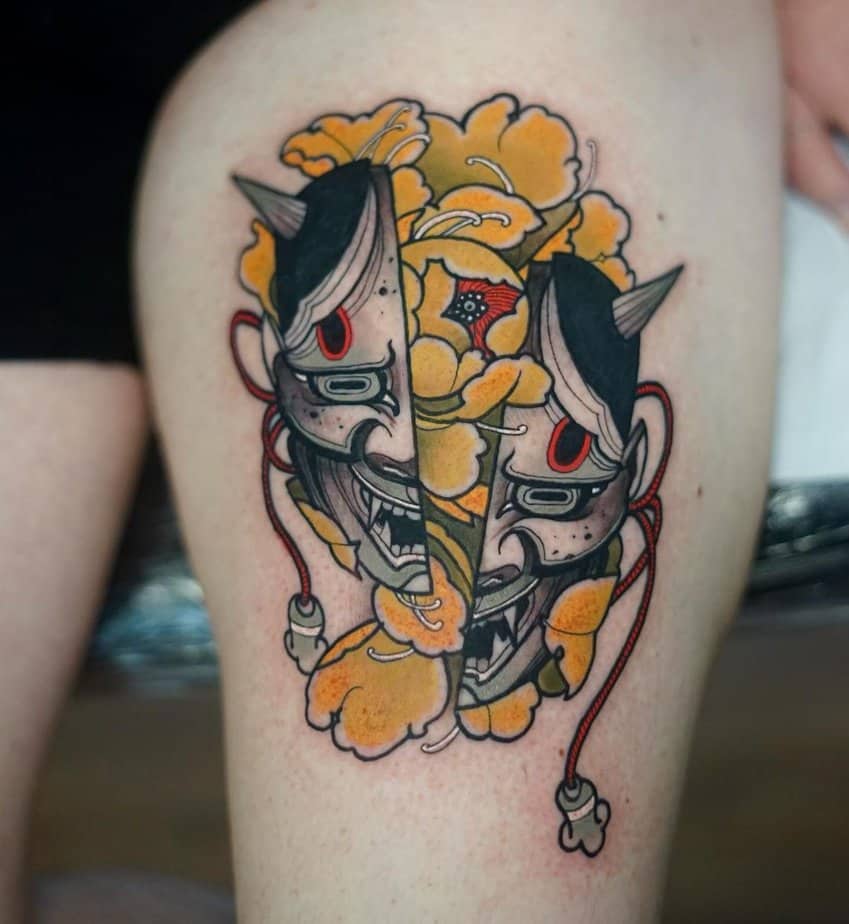 Hannya split by a burst of vibrant yellow flowers