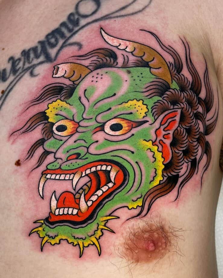Vibrant green Hannya with a goblin-like face