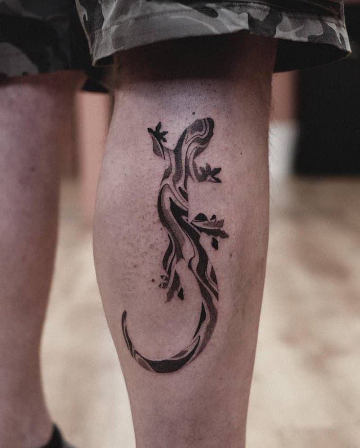 Minimal black gecko tattoo