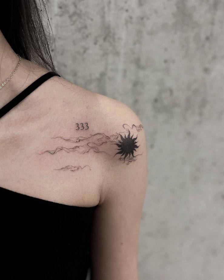 Delicate 333 tattoo with black sun