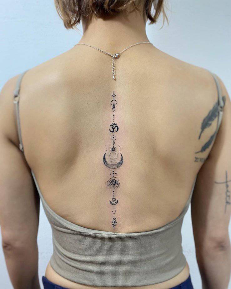 Celestial spine tattoo