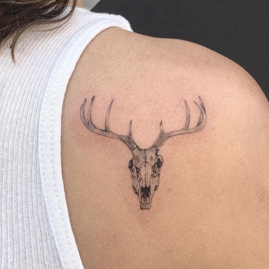 Shoulder blade deer skull tattoo