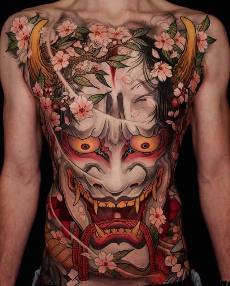 Chest piece with cherry blossoms entwined with Hannya mask