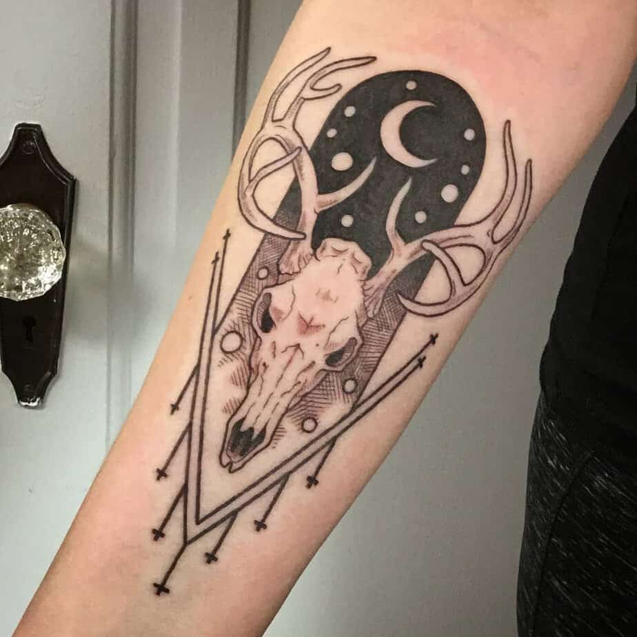 Celestial deer skull with moon and stars