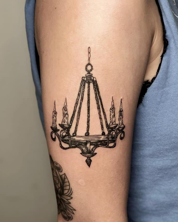 Classic chandelier tattoo with rustic feel