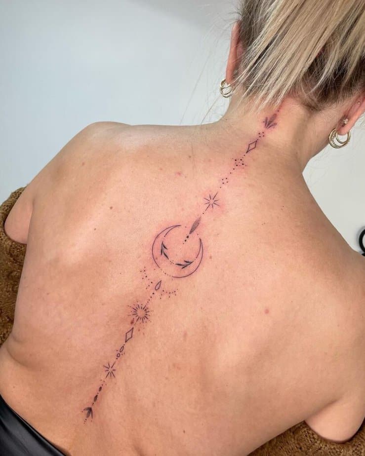 A celestial spine tattoo