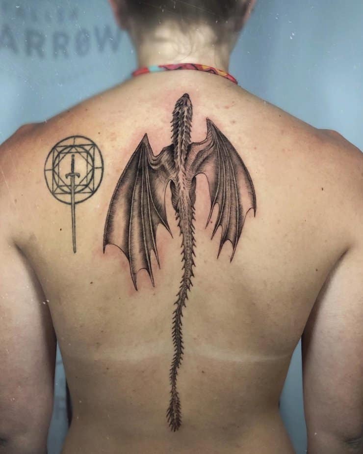 Dragon and sword tattoo