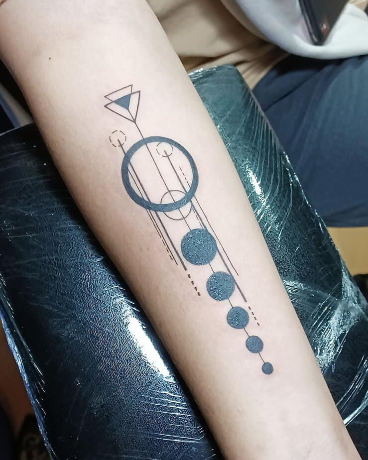 Geometric forearm tattoo