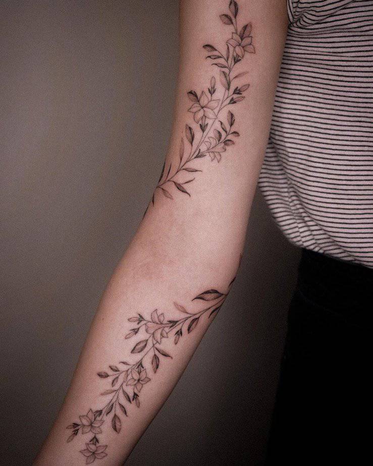 1. A jasmine tattoo across the entire arm