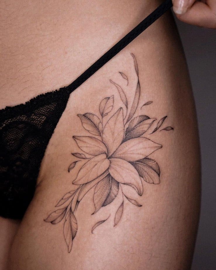4. A jasmine tattoo on the thigh