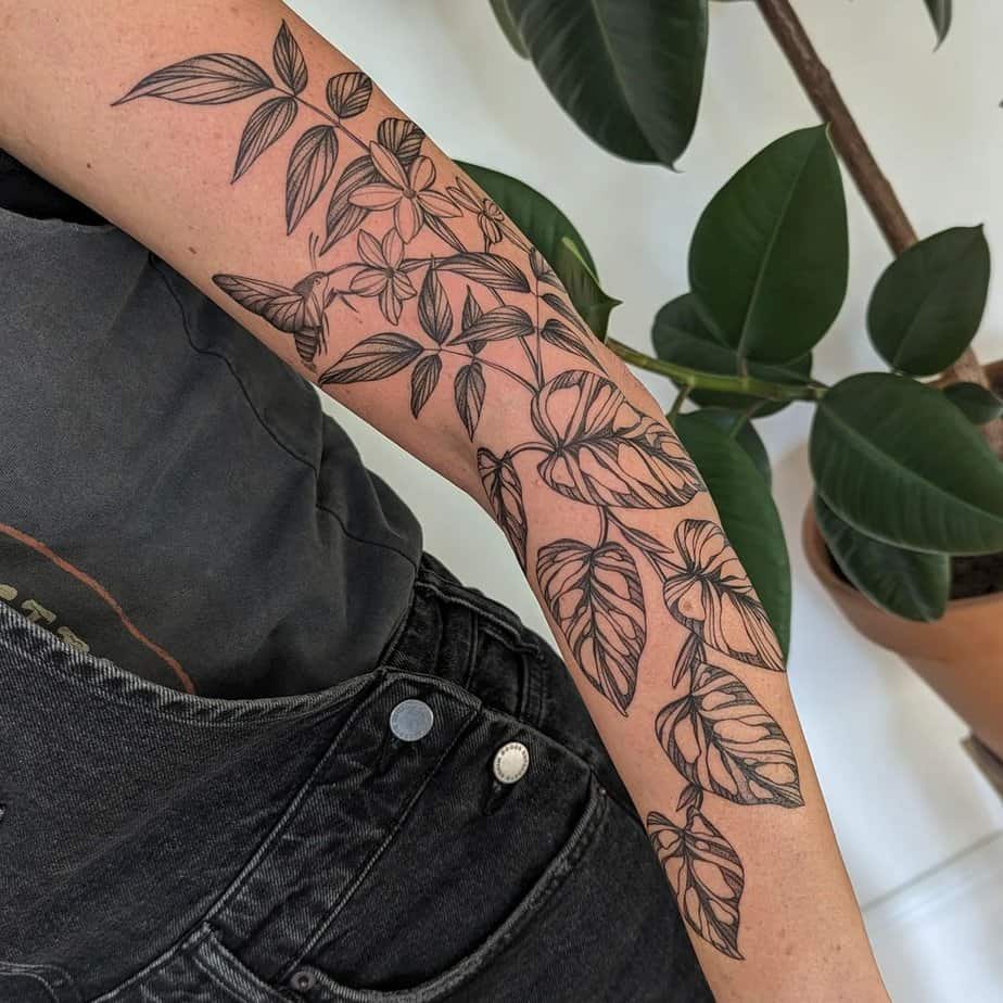17. A jasmine-themed tattoo sleeve
