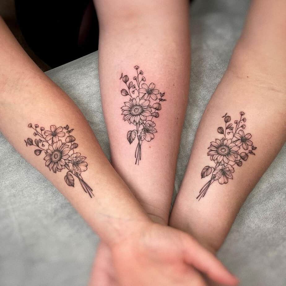 9. A matching floral tattoo featuring a jasmine flower