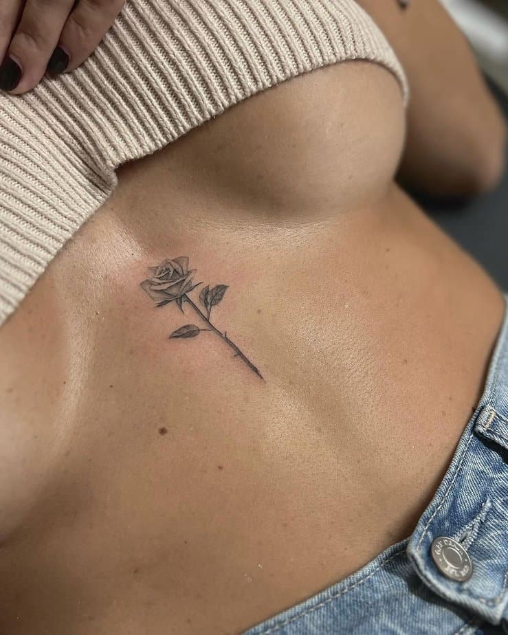 A rose sternum tattoo