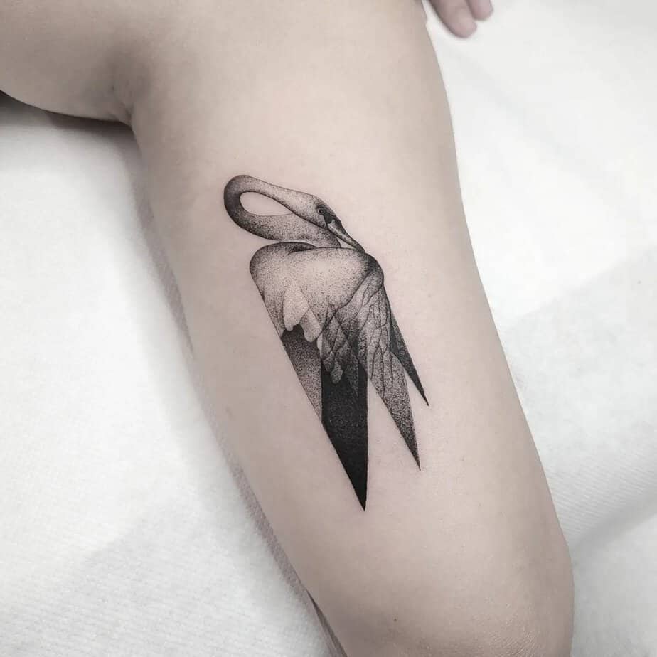 A sad swan dotwork tattoo