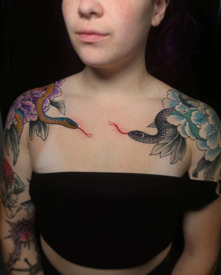 Japanese-style snake and flowers tattoo