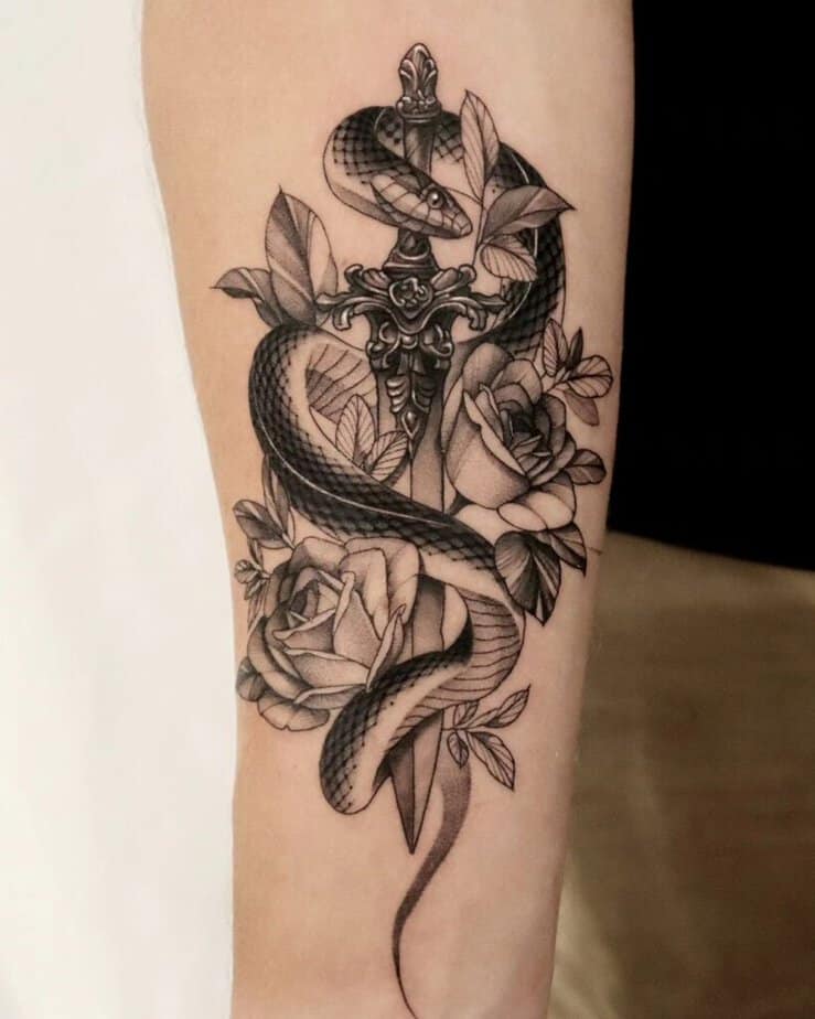Snake with flowers and a sword or dagger