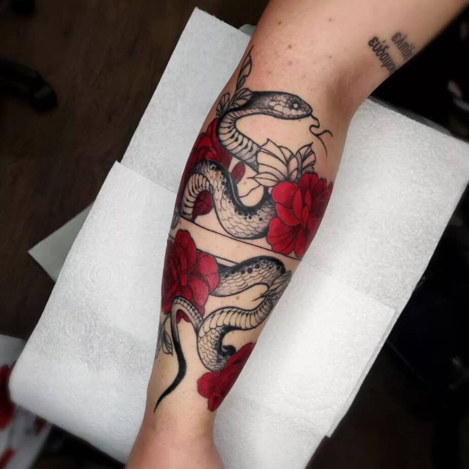 Floral snake bracelet tattoo