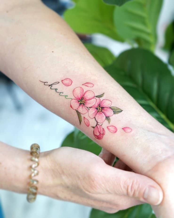 Apple blossom tattoo with lettering