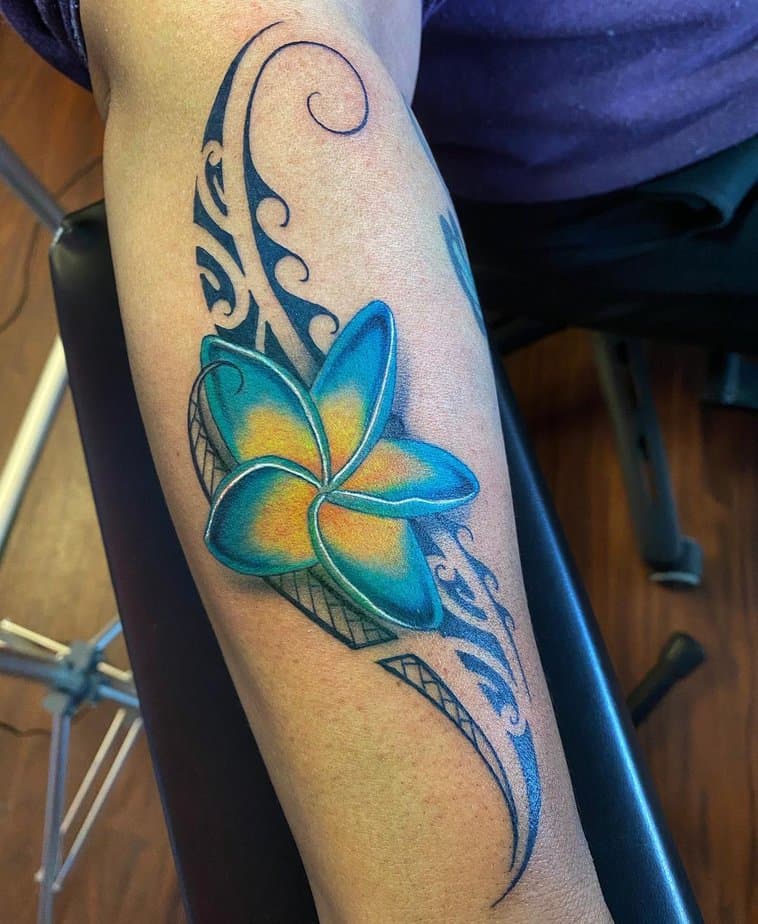 Blue plumeria tattoo