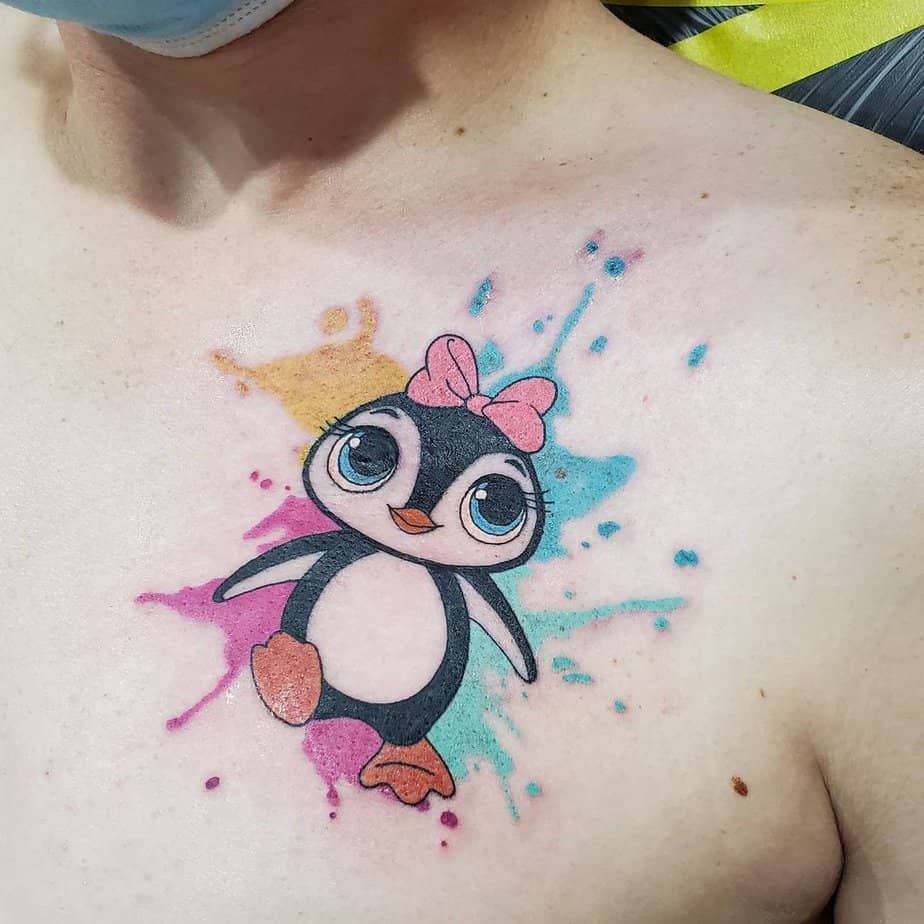 Cartoon-like penguin tattoos 2