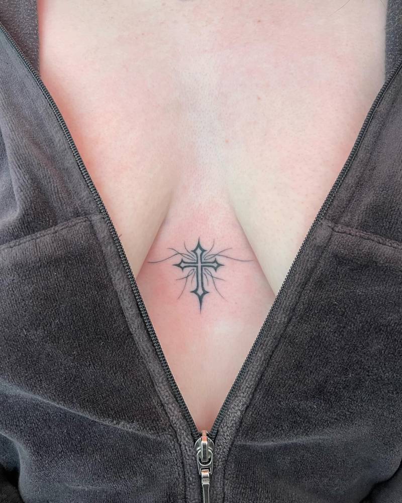 Christian cross sternum tattoo