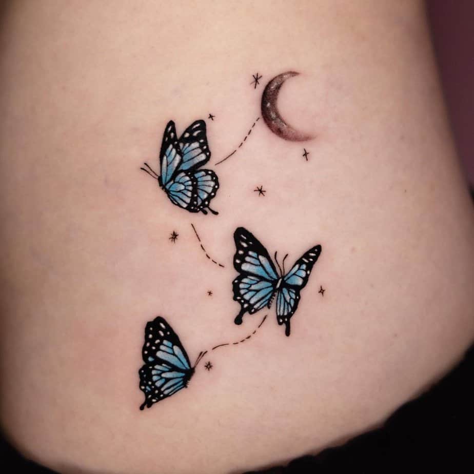 Blue butterflies tied together heading to the moon