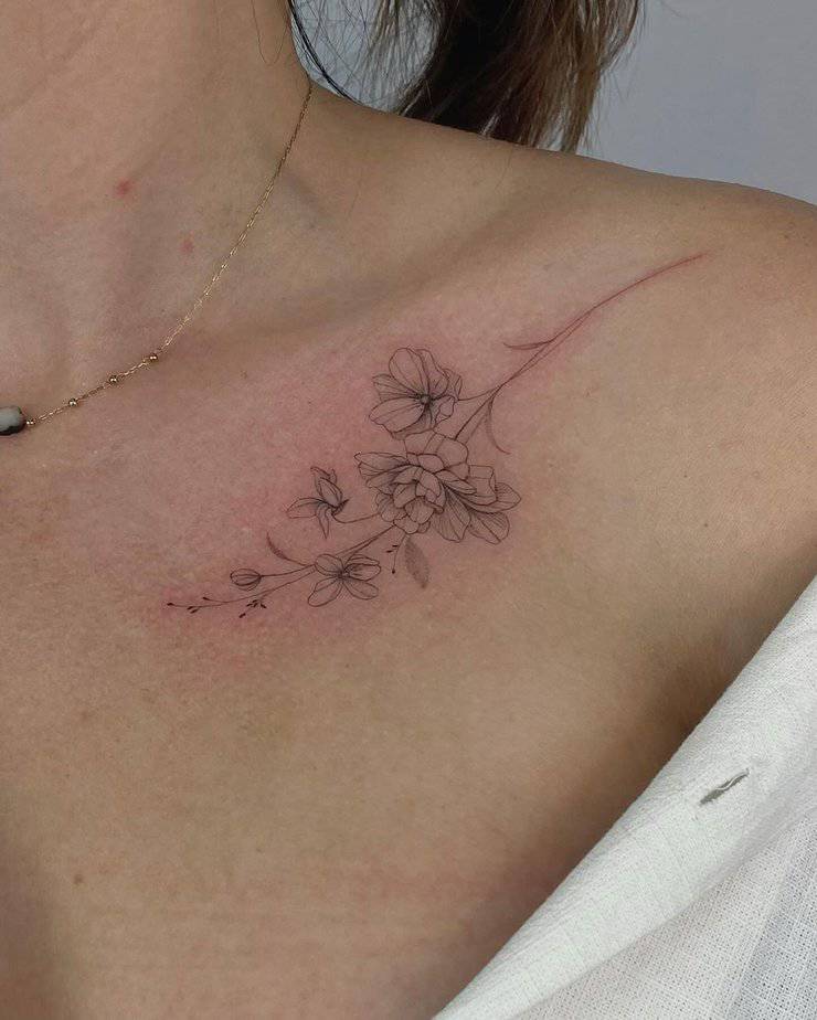 Collarbone wildflower tattoo