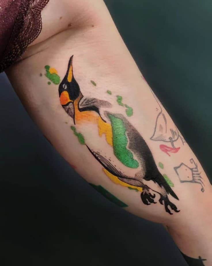 Colorful penguin tattoo ideas 1