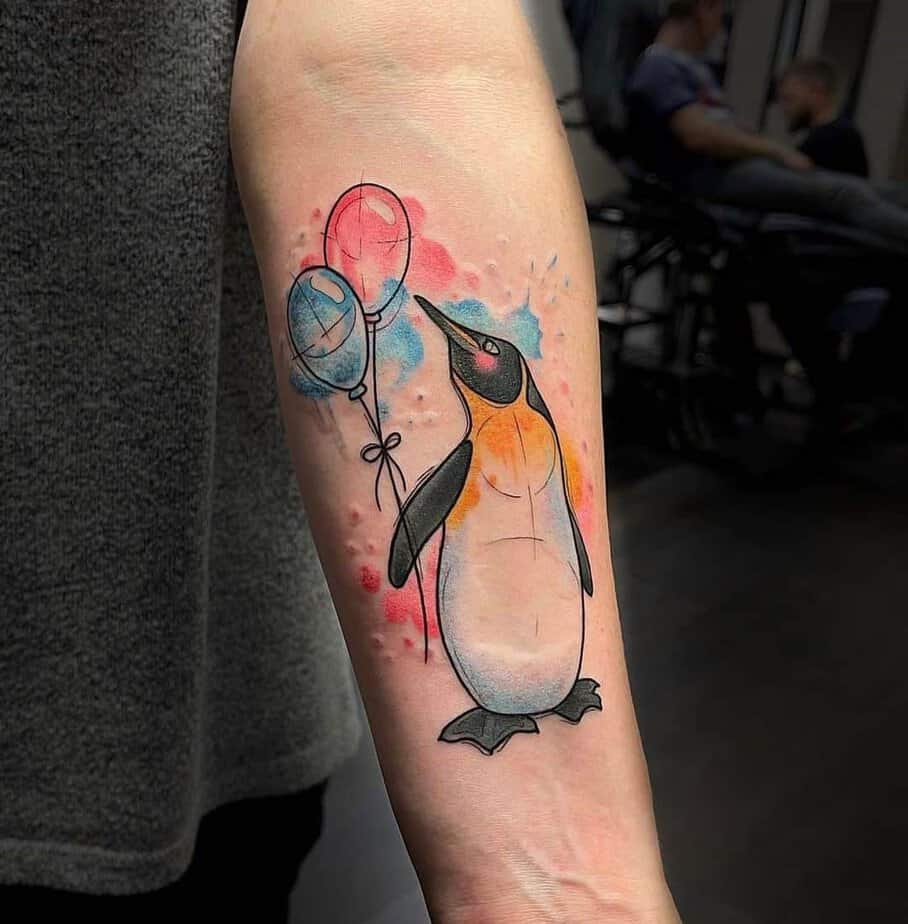 Colorful penguin tattoo ideas 10