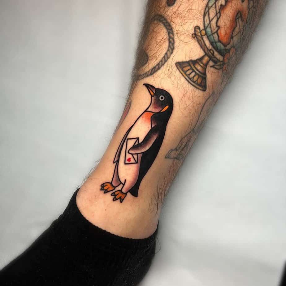 Colorful penguin tattoo ideas 4