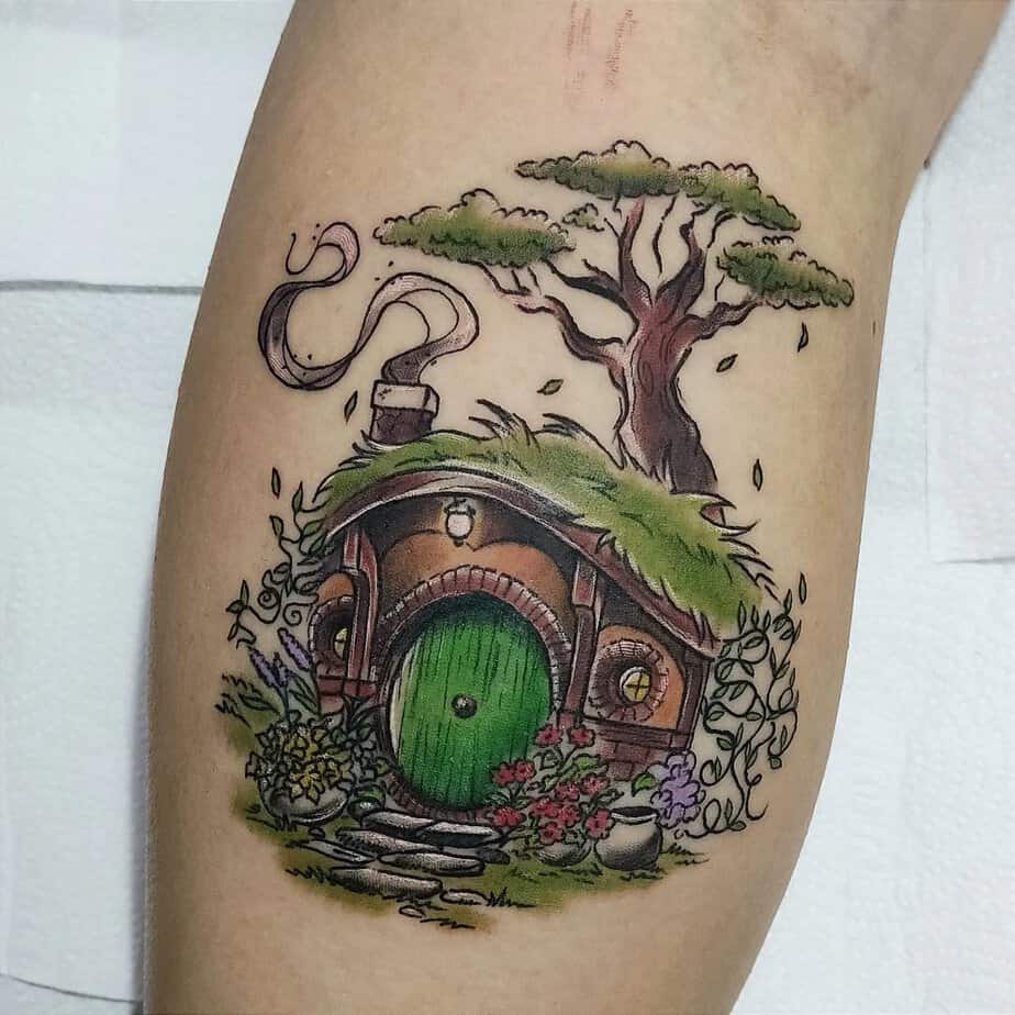 Whimsical Hobbit house with flowers and intricate details