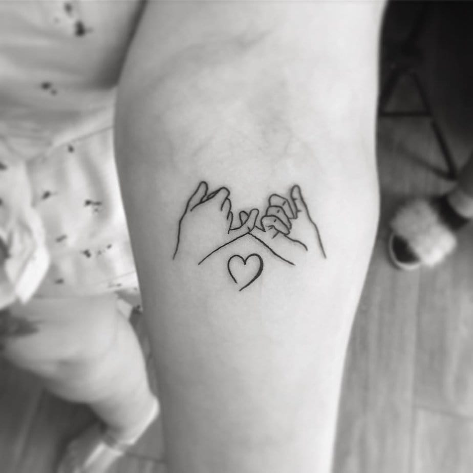 Cute heart outline pinky promise tattoo
