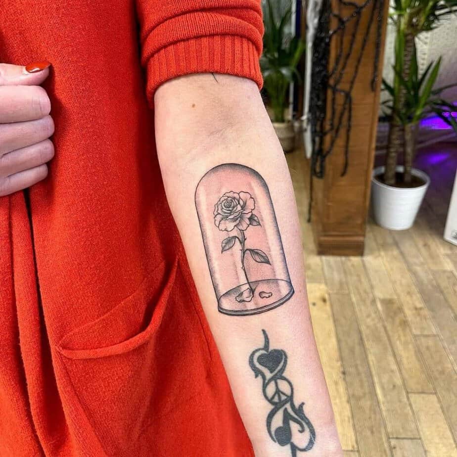 Enchanted rose tattoo