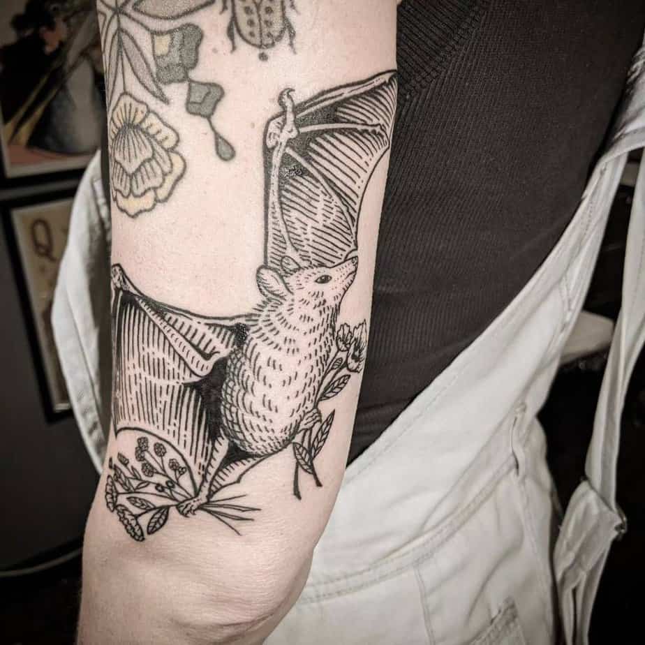 Flying bat tattoo