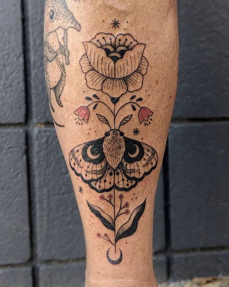Folk moth tattoo