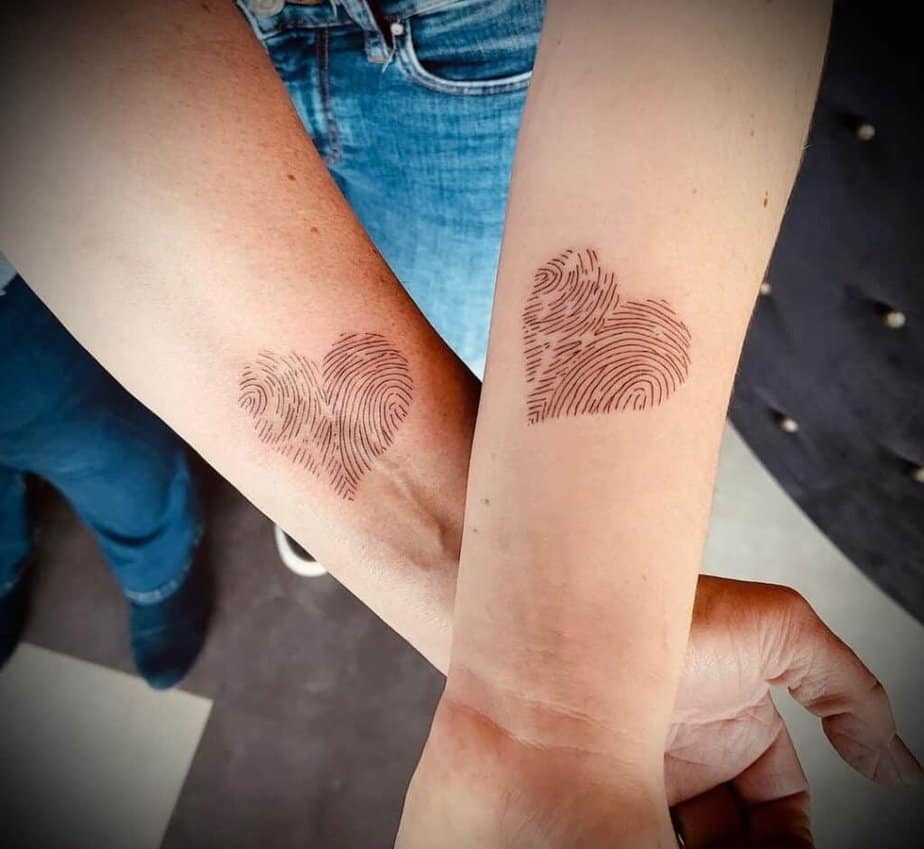 16. Matching fingerprint tattoos