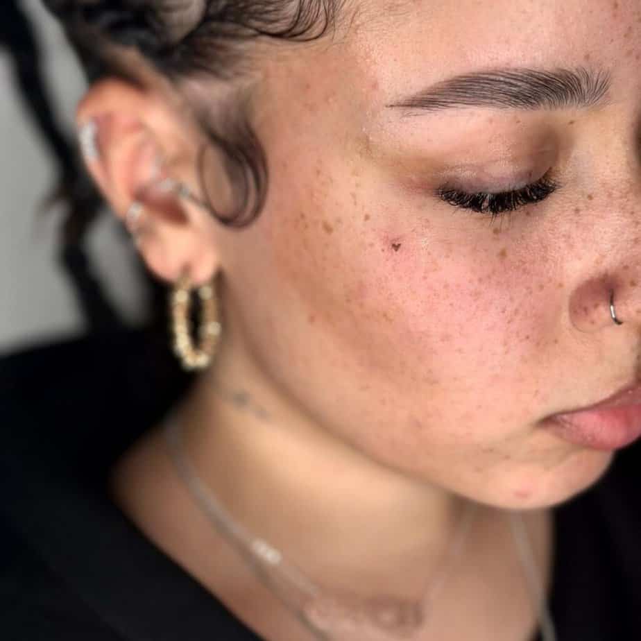 22. A heart freckle tattoo