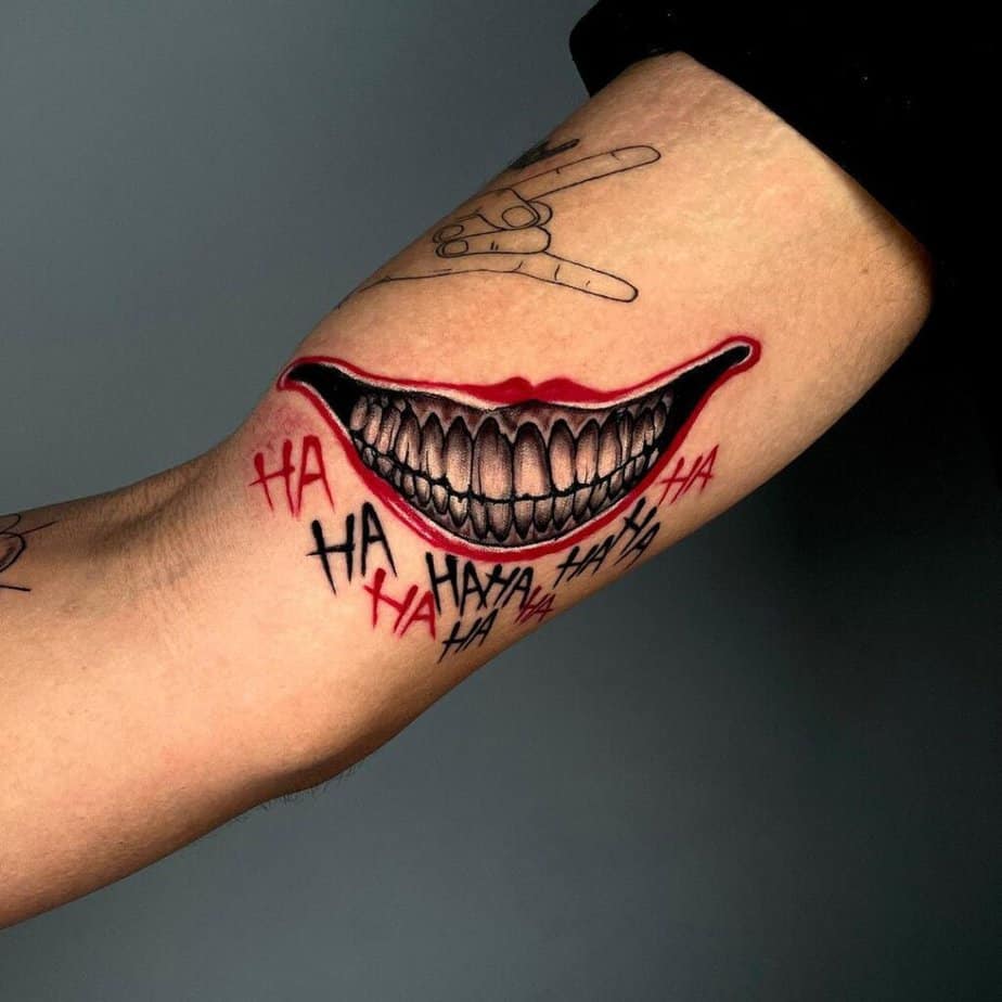 21. A Joker&rsquo;s smile tattoo on the inside of the arm