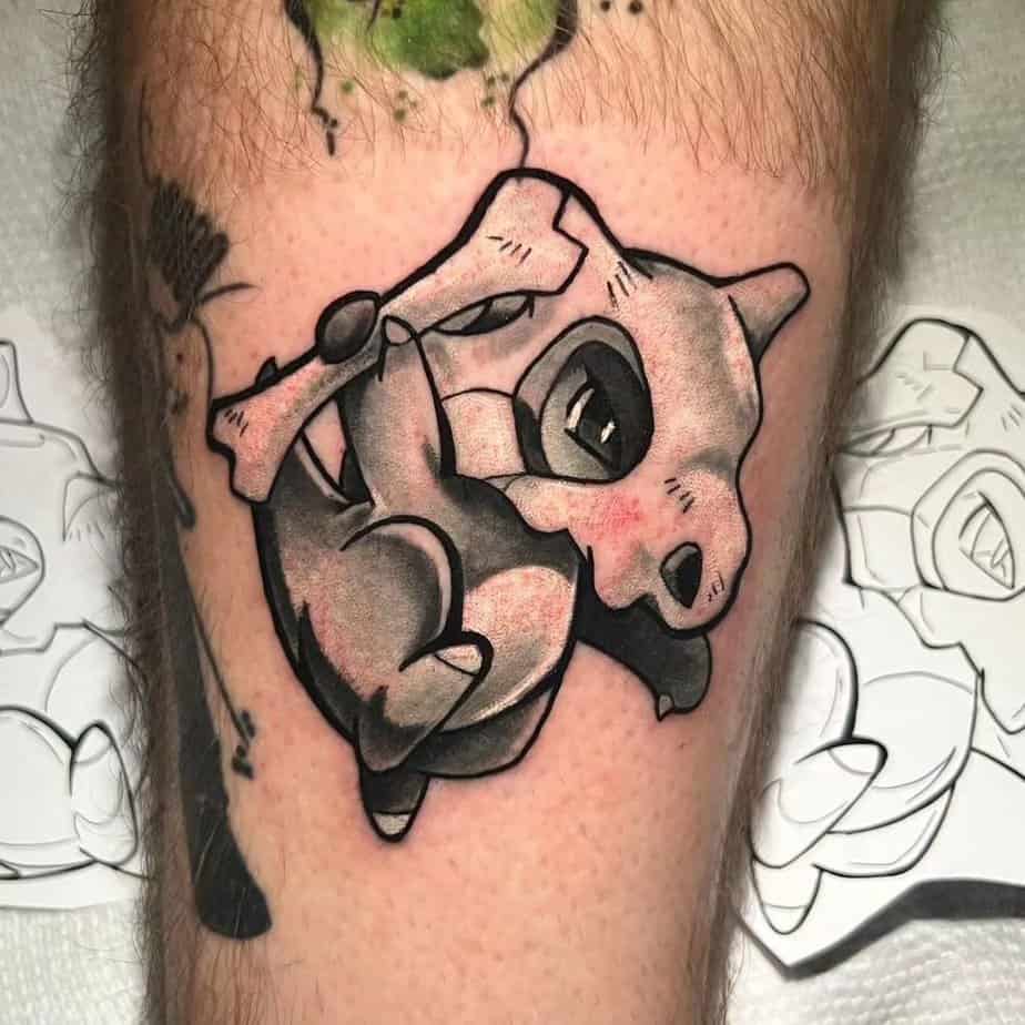 Black and gray Pokémon tattoos