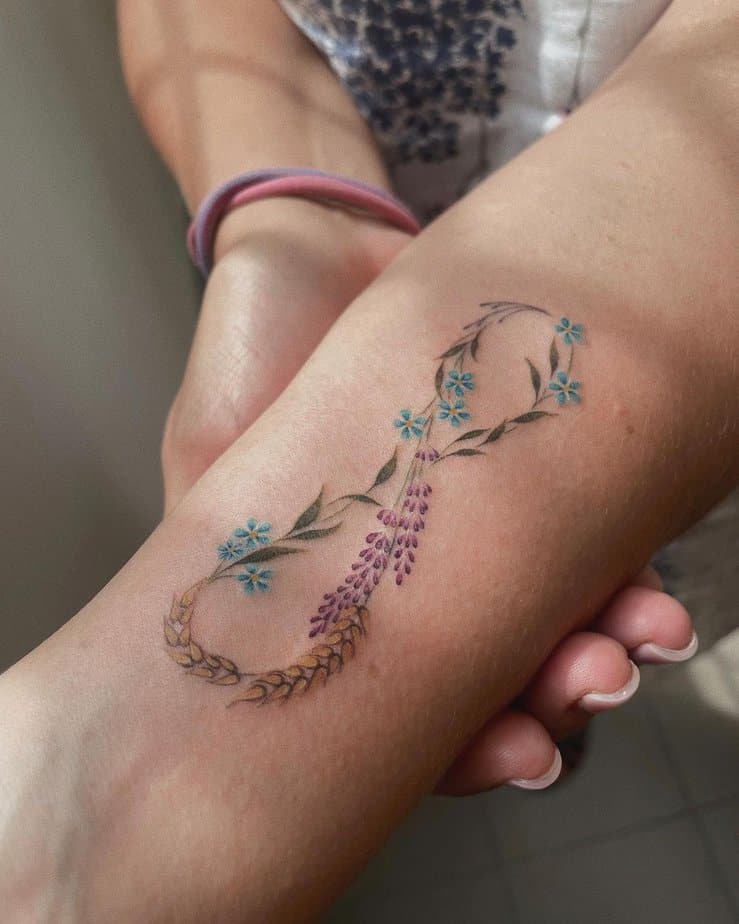 Infinity tattoo with forget me nots