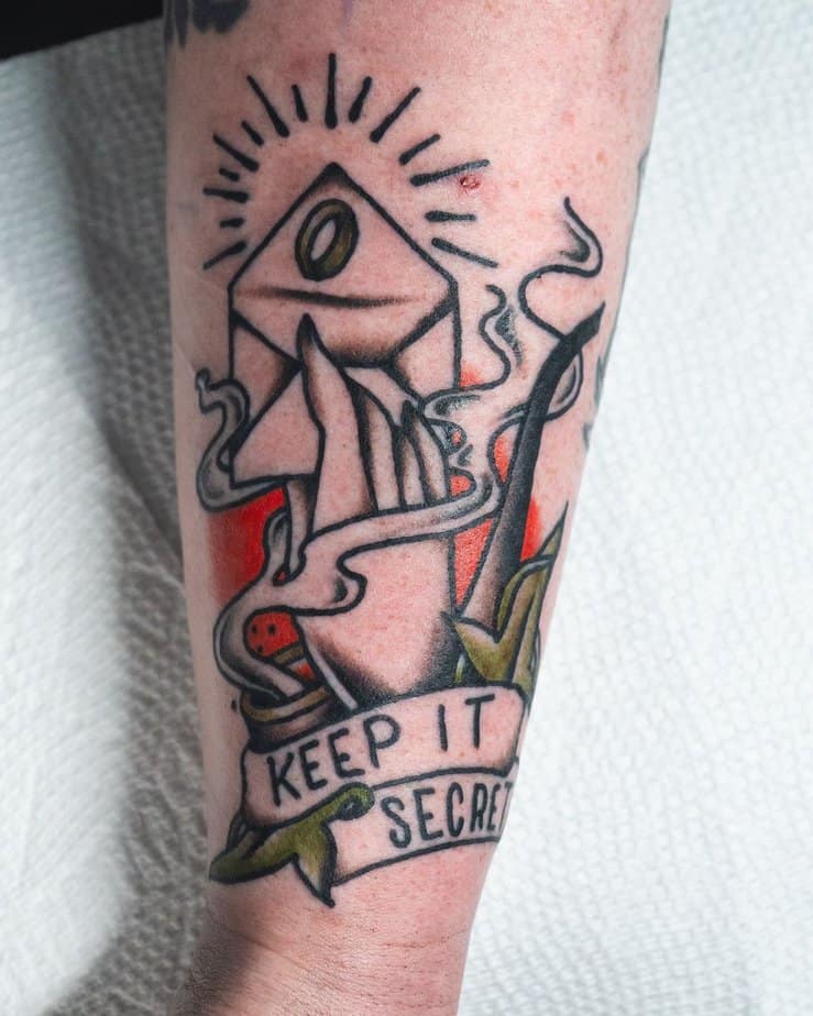 Hand opening an envelope to reveal a ring with the words 