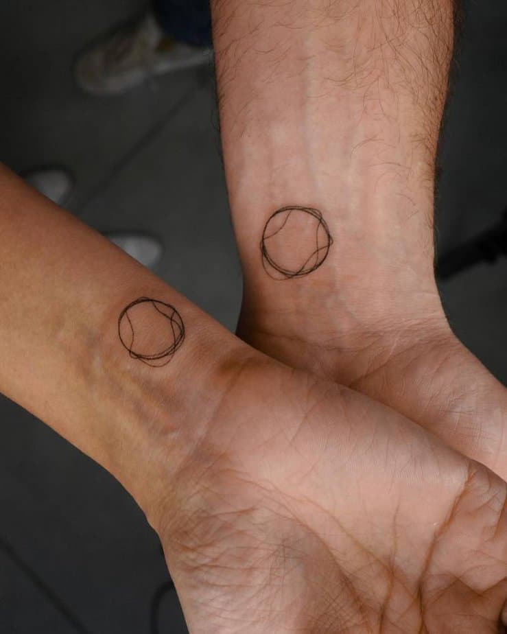 Matching circle tattoos