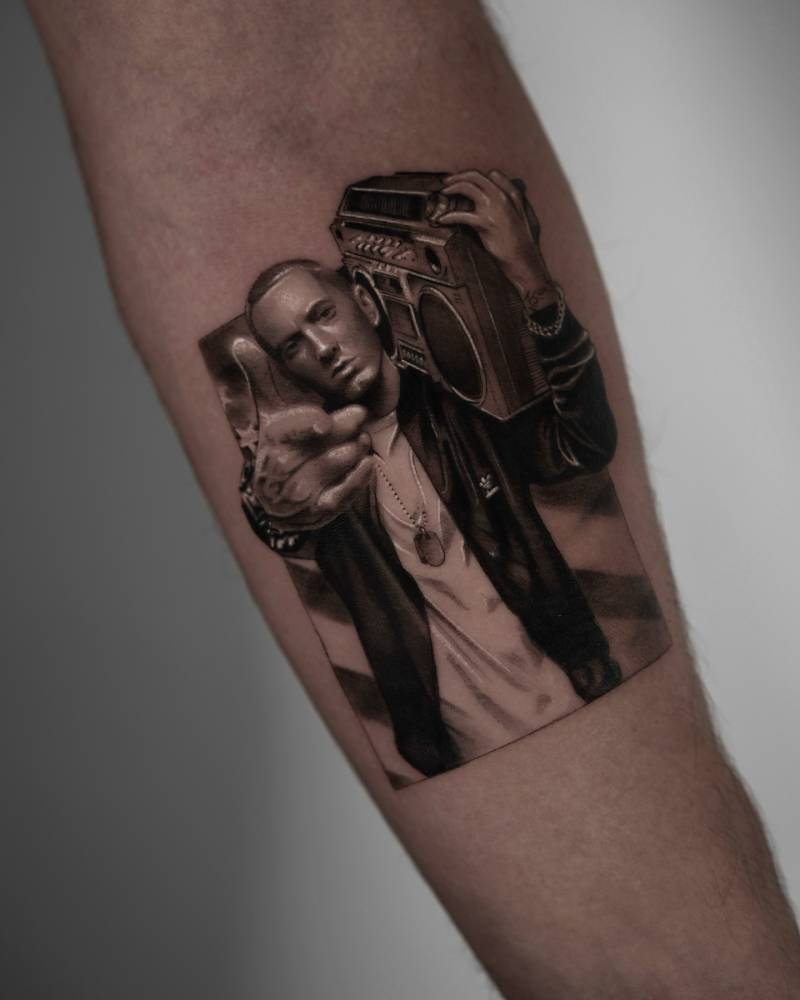 Micro-realistic Eminem tattoo
