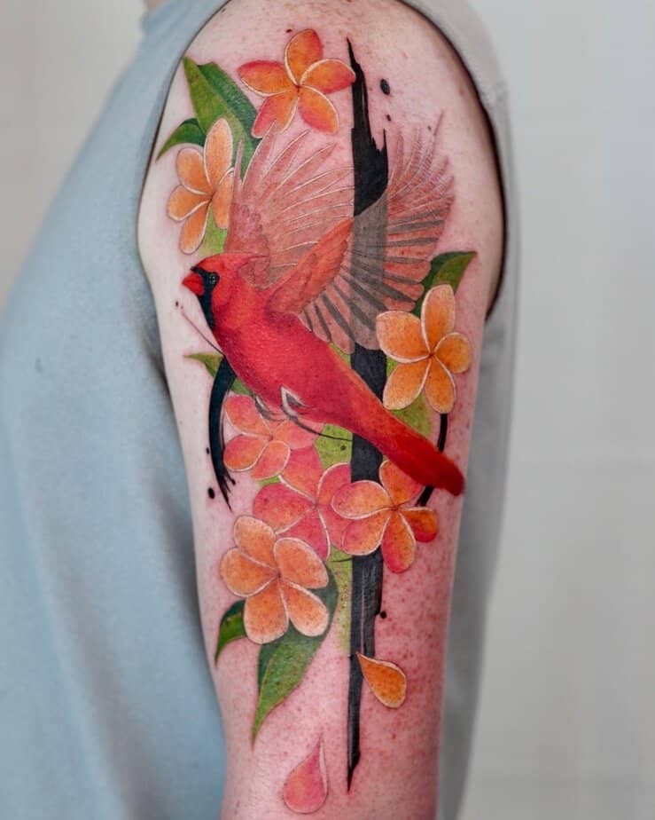 Northern cardinal and plumerias tattoo