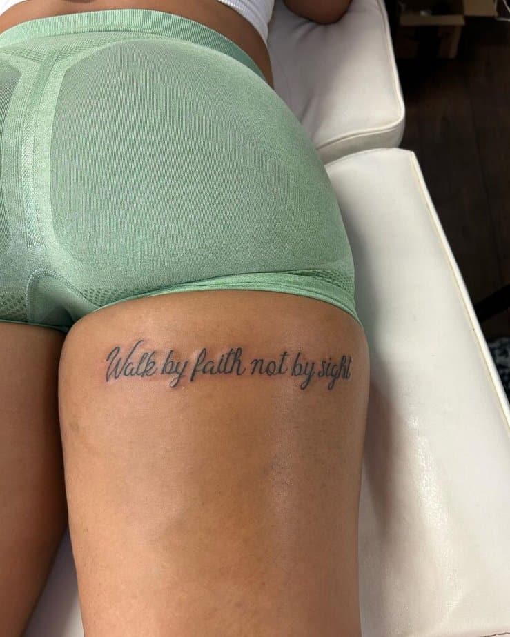 13. A tattoo on the back of a thigh