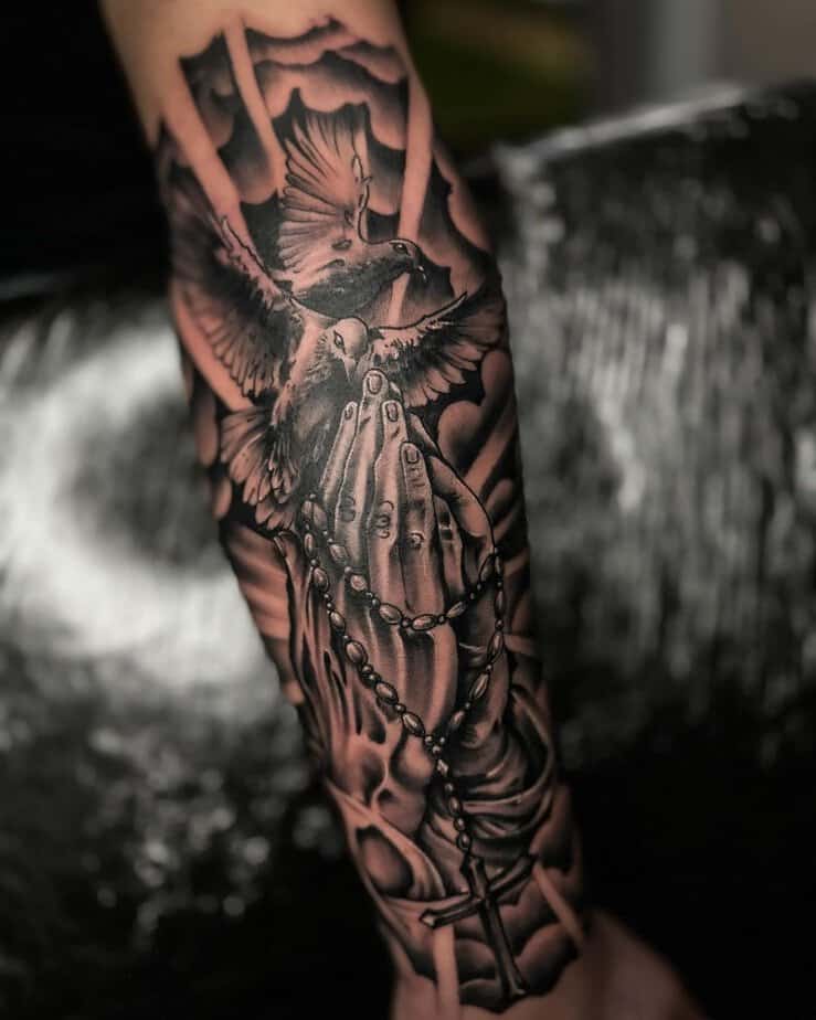 Rosary and dove tattoo
