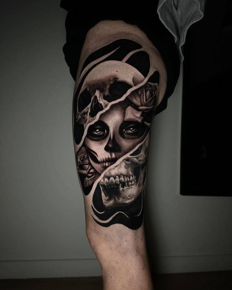 Santa Muerte split skull thigh tattoo