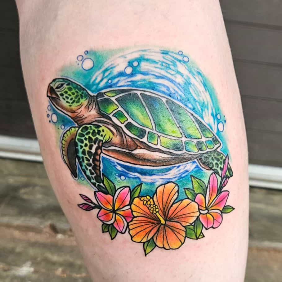 Sea turtle and plumerias tattoo